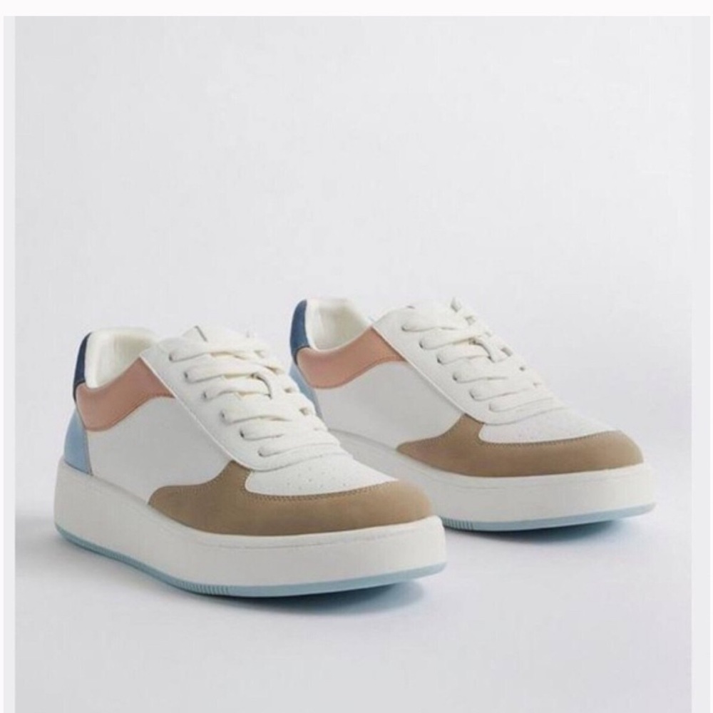 Torrid sneakers size 9WW. Block coloring white, pink, blue, and brown.